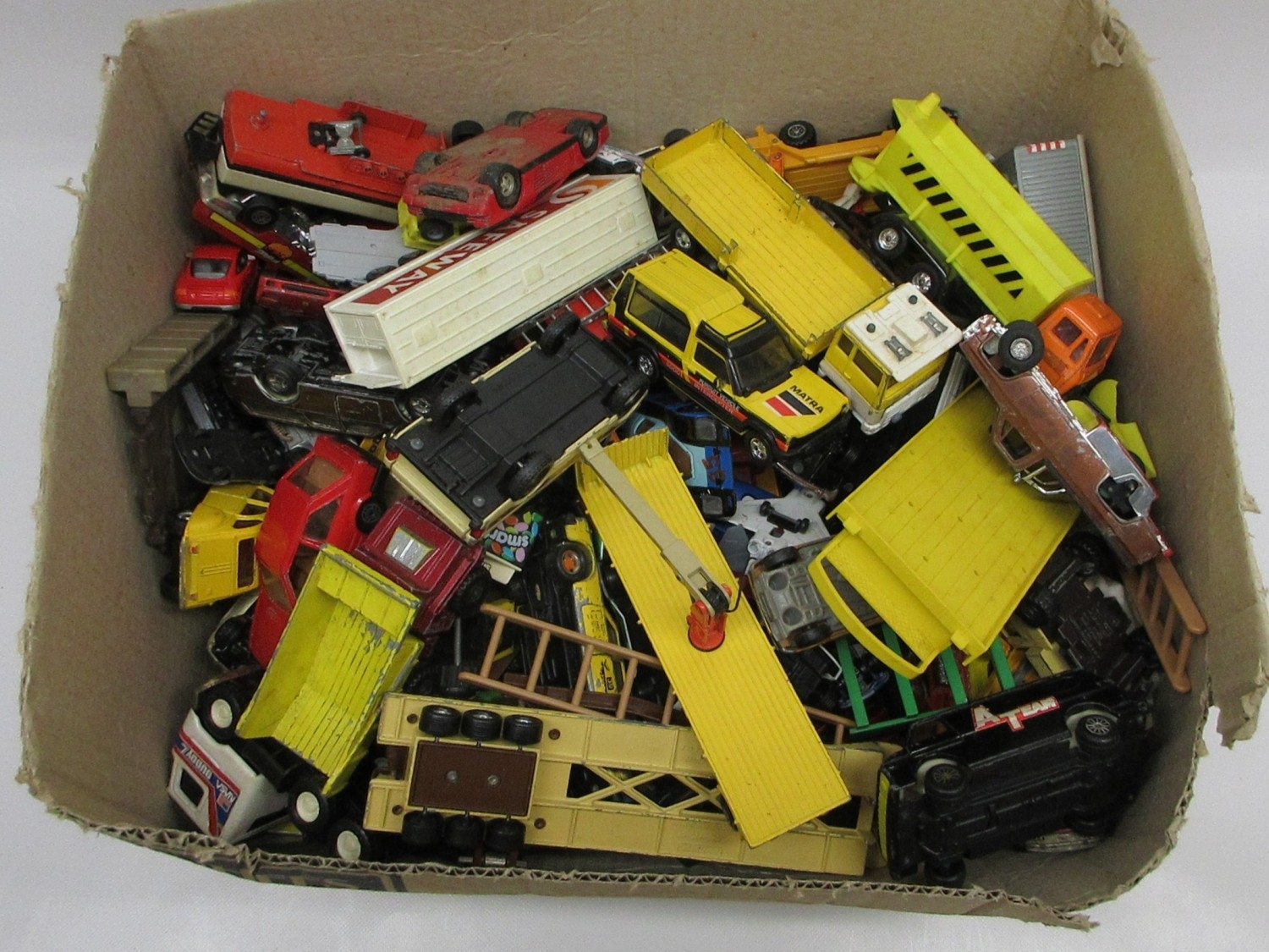 Mixed collection of vintage toy cars, trucks and other vehicles of ...