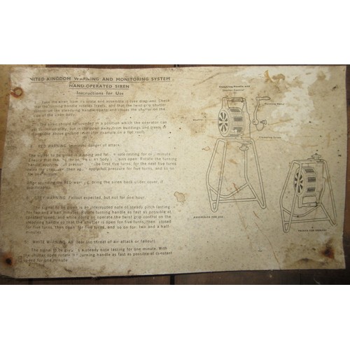 137 - Mid-century British hand-operated air raid siren, complete with transport crate and instructions.
Sh... 