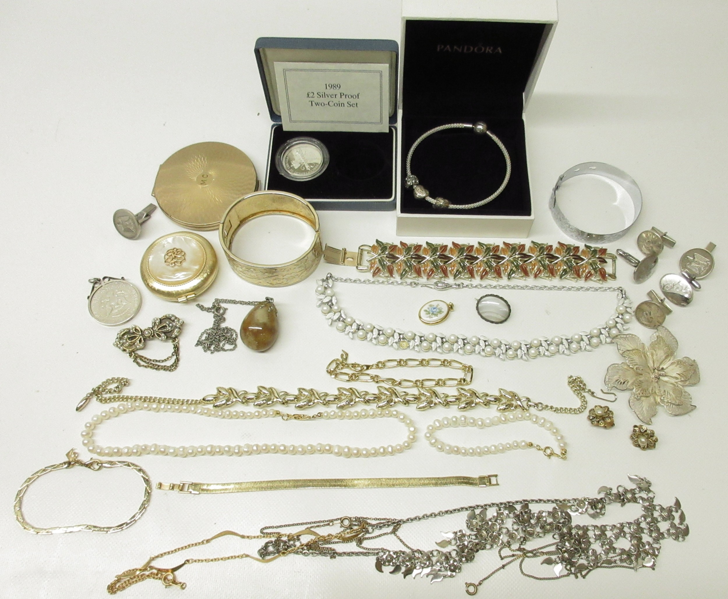 Pandora bracelet with three charms, collection of costume jewellery to ...