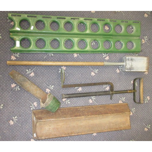 138 - Collection of ammunition items, shell loader, incendiary shovel, large piece of shrapnel, stirrup pu... 