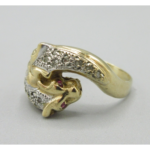 1054 - 9ct yellow gold panther ring, crossover head set with ruby eyes and diamond backs, stamped 375, size... 