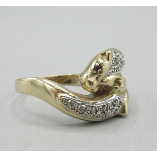 1054 - 9ct yellow gold panther ring, crossover head set with ruby eyes and diamond backs, stamped 375, size... 
