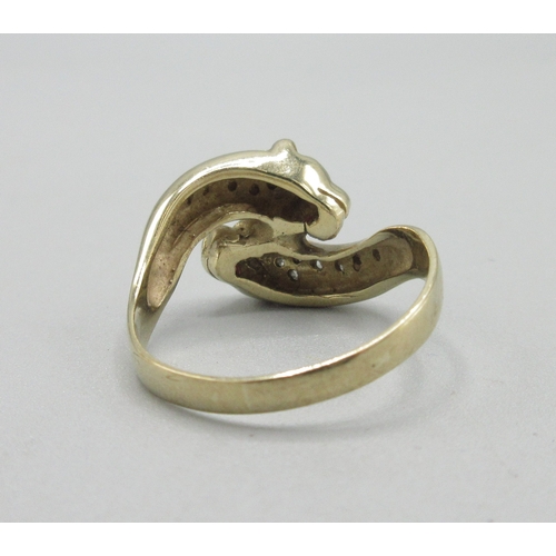1054 - 9ct yellow gold panther ring, crossover head set with ruby eyes and diamond backs, stamped 375, size... 
