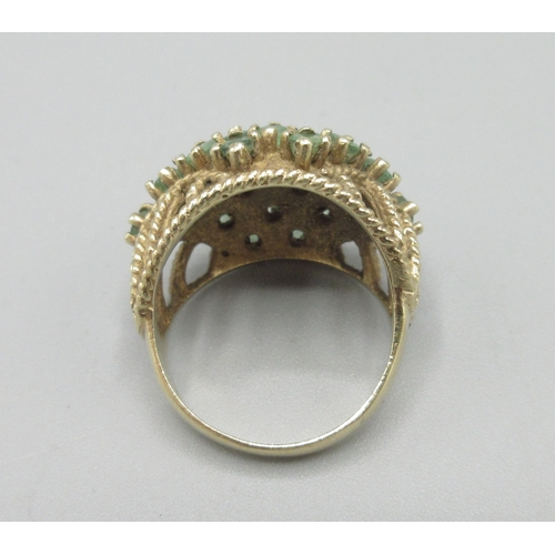 1044 - 9ct yellow gold cocktail cluster ring set with emerald, stamped 375, size N, 7.6g

Bradleys shipping... 