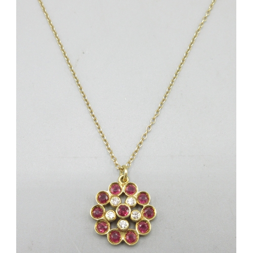 1023 - 18ct yellow gold necklace, flower pendant set with diamonds and rubies, chain and pendant stamped 75... 