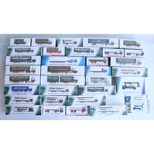 Thirty two 1/76 scale Eddie Stobart themed diecast model trucks and ...