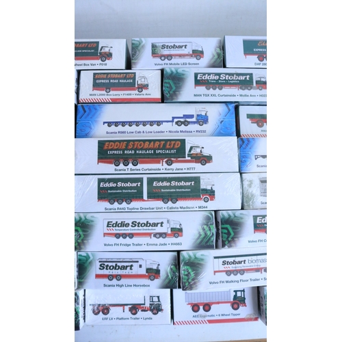Thirty two 1/76 scale Eddie Stobart themed diecast model trucks and ...