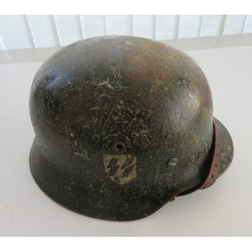 208 - WW11 SS M40 helmet with single Decal, complete with original leather lining and chinstrap, the paint... 