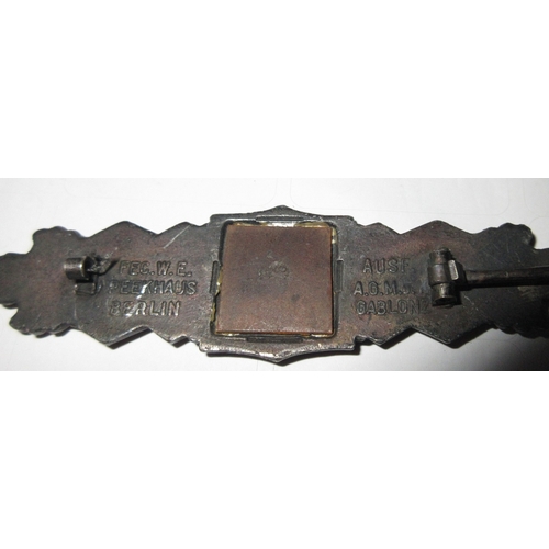 10 - WWII German Silver close combat clasp, with original pin, stamped and copper backing weight

Bradley... 