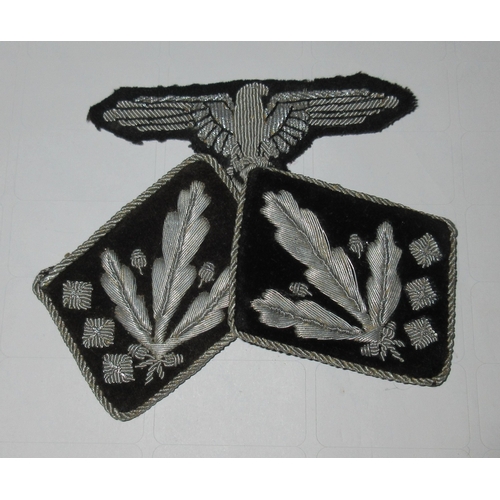 12 - Five pieces of German WWII style cloth insignia

Bradleys shipping £28.00 plus vat (UK Only)