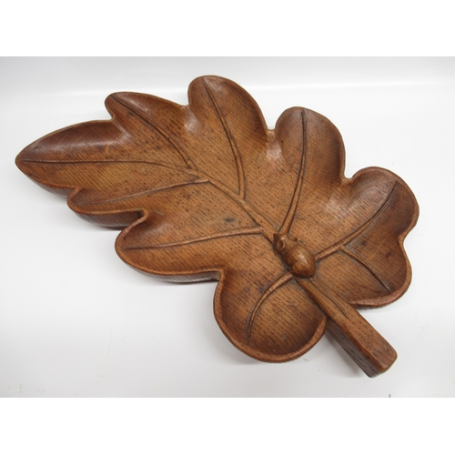 Robert Mouseman Thompson of Kilburn - an unusual carved oak leaf shaped dish with angular handle and carved with signature mouse, W37.5cm D23cm H5cm

Bradleys shipping £38.00 plus vat (UK Only)