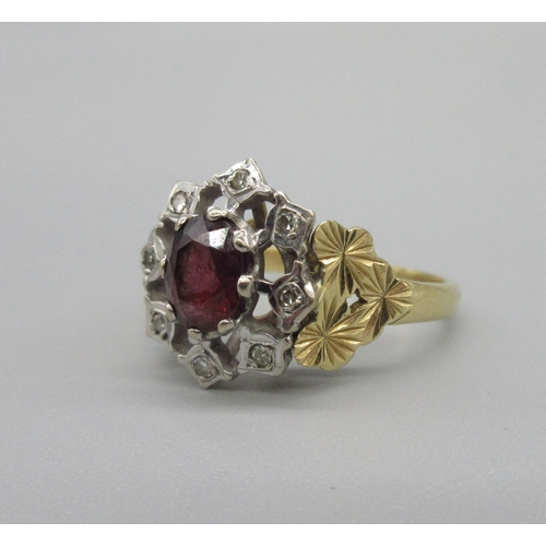 1034 - Georgian style 18ct yellow gold ruby and diamond ring, oval cut ruby with a pierced halo of diamonds... 