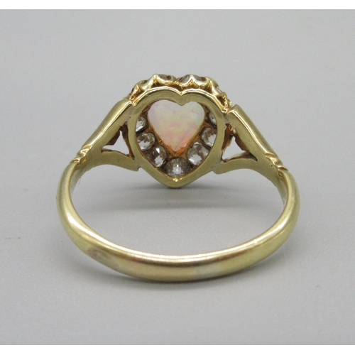 1019 - 18ct yellow gold opal and diamond ring, heart shaped cabochon opal surrounded with a halo of old cut... 