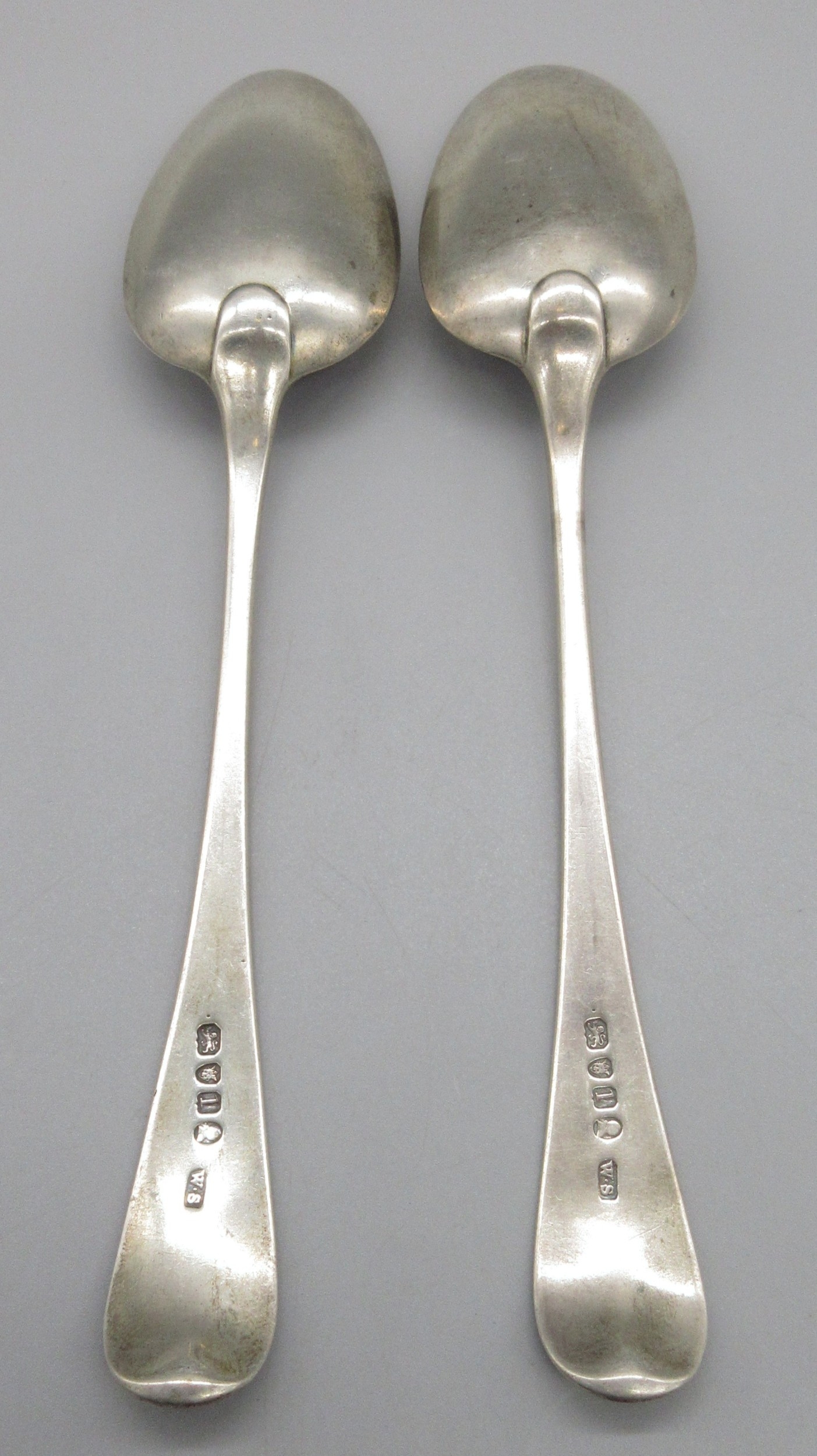 Pair of George III silver monogrammed serving spoons by William ...