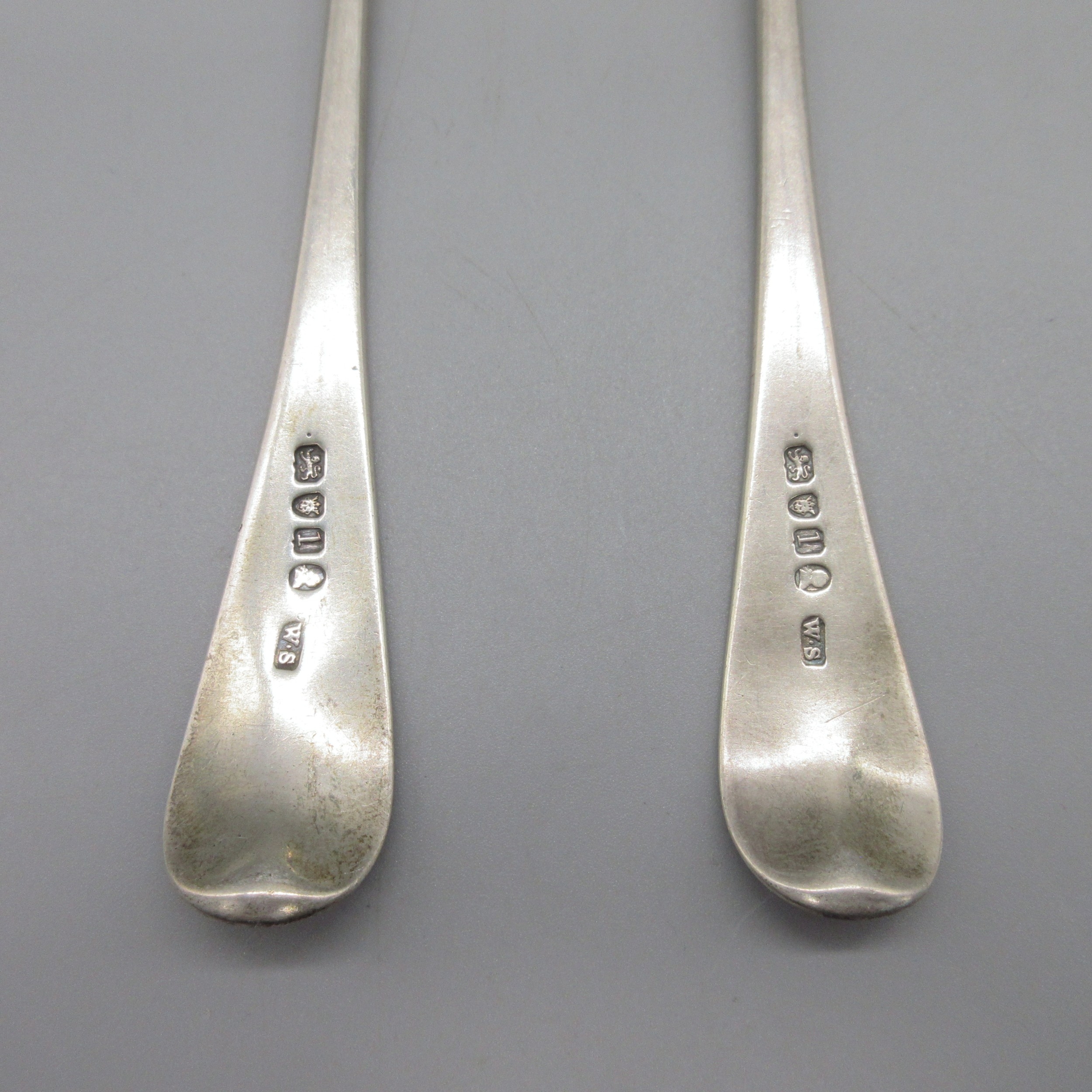 Pair of George III silver monogrammed serving spoons by William ...
