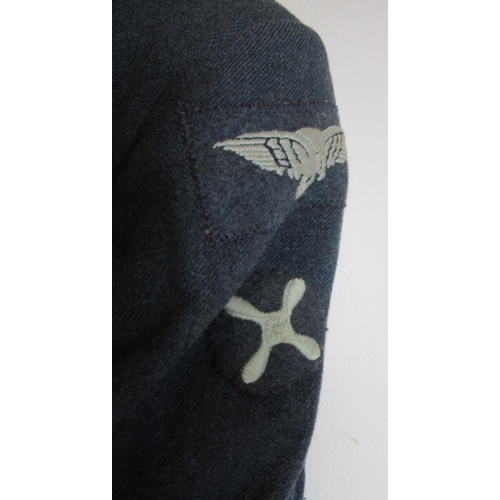 192 - Three circa mid-20th century RAF tunics, W46-49cm, with pair of trousers and cap (4)

Bradleys shipp... 