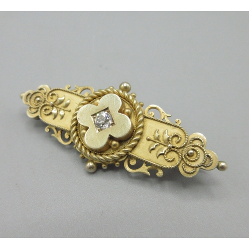 1047 - 15ct gold and diamond Victorian Etruscan revival brooch, central clover-like setting rotates in rope... 