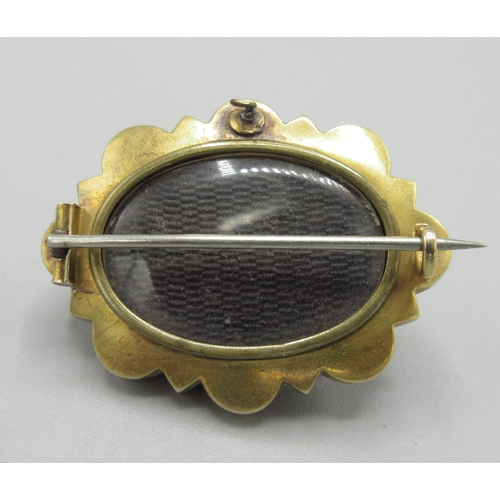 1048 - Victorian unmarked yellow metal mourning brooch, central pearl in star setting lined with blue ename... 