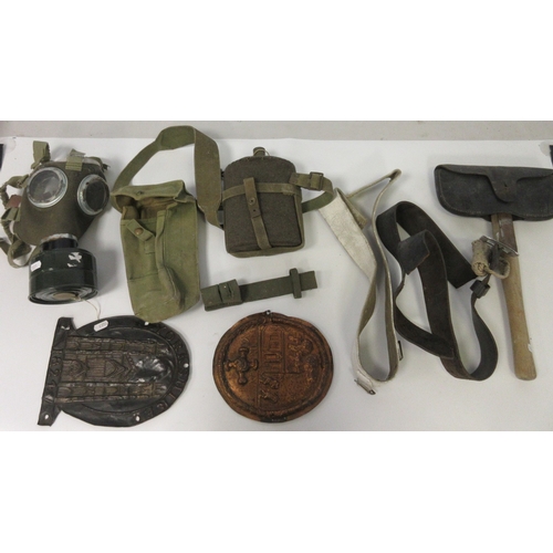 140 - Collection of military items. Brodie helmet, water bottle, ammo pouch, gas mask, webbing belt, bugle... 