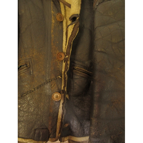 142 - US Army Air force flying jacket converted to button fastening with original label, pair of pilots le... 