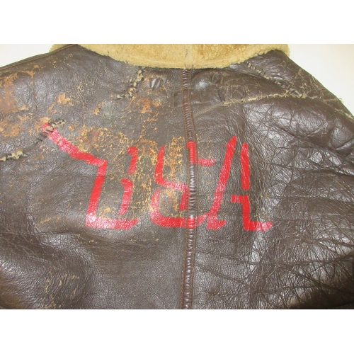 142 - US Army Air force flying jacket converted to button fastening with original label, pair of pilots le... 