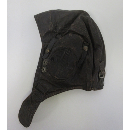 142 - US Army Air force flying jacket converted to button fastening with original label, pair of pilots le... 