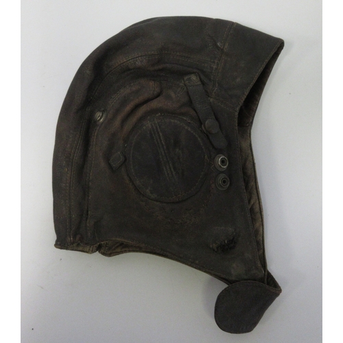 142 - US Army Air force flying jacket converted to button fastening with original label, pair of pilots le... 