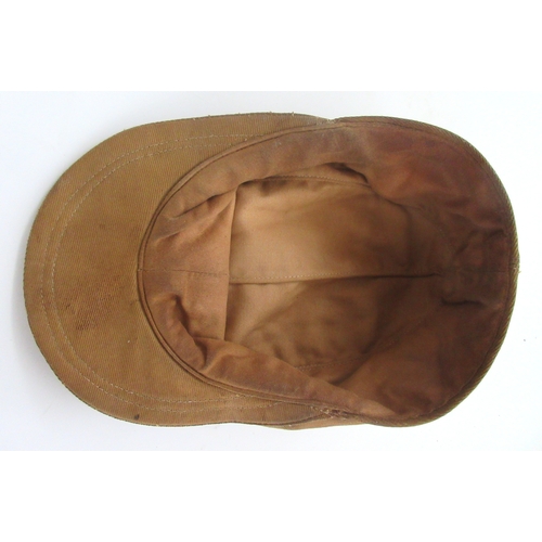 217 - German WWII M41 tropical field cap, also known as an Afrika Korps cap, with eagle emblem and nationa... 