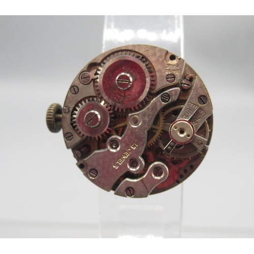 417 - Swiss ladies 9ct gold wristwatch with hinged lugs on leather strap, white enamel Arabic dial, snap o... 