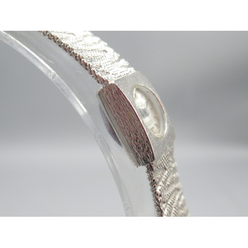 418 - Swiss Empress silver wristwatch on integrated textured bracelet, signed silver sunburst dial with ba... 