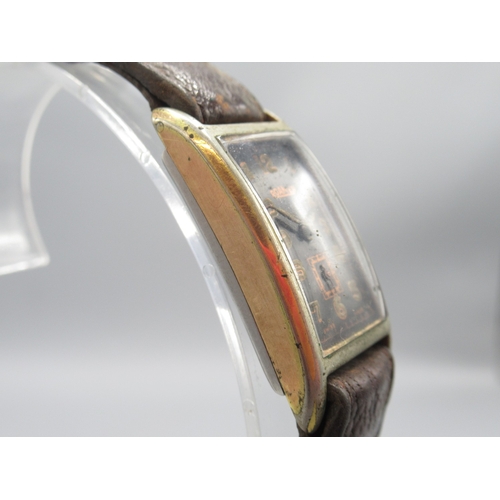 421 - Roamer plated and stainless steel tank case wristwatch on period leather strap, signed black Arabic ... 