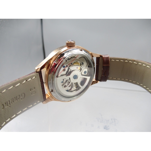 427 - Ailang rose gold plated automatic wristwatch on original brown leather strap signed butterfly clasp,... 