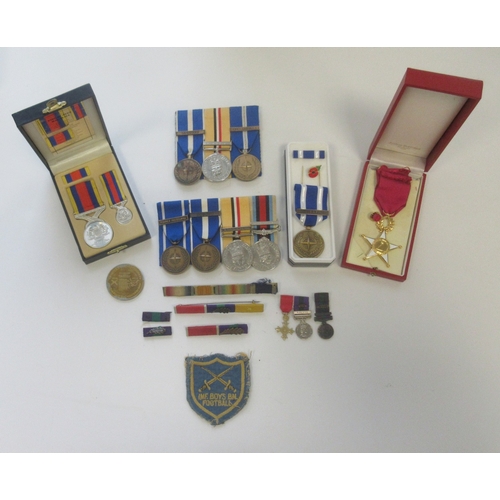 23 - Collection of Medals, miniatures, and ribbons from various conflicts. Iraq Medal with clasp, NATO Se... 