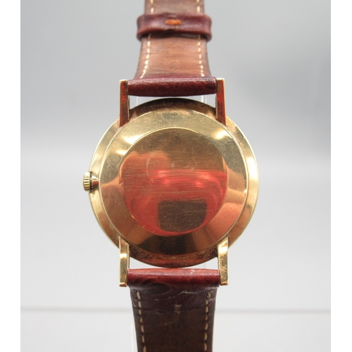 455 - Omega 9ct gold wristwatch on later leather strap with 9ct gold Omega buckle, Birmingham 1963, signed... 