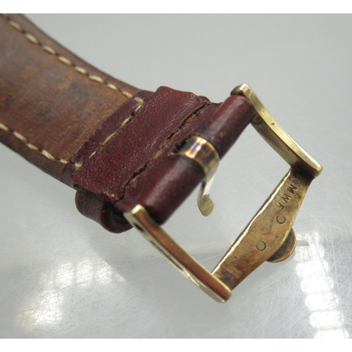 455 - Omega 9ct gold wristwatch on later leather strap with 9ct gold Omega buckle, Birmingham 1963, signed... 