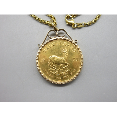 51 - 1975 1oz Krugerrand in 9ct hallmarked mount with .375 hallmarked to clasp chain (44.7g)

Bradleys Sh... 
