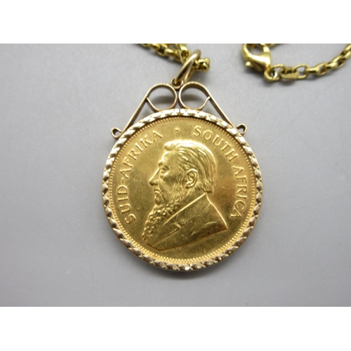 51 - 1975 1oz Krugerrand in 9ct hallmarked mount with .375 hallmarked to clasp chain (44.7g)

Bradleys Sh... 