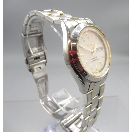 464 - Seiko Kinetic 50m stainless steel and gold plated wristwatch with day/date on matching bracelet, sig... 