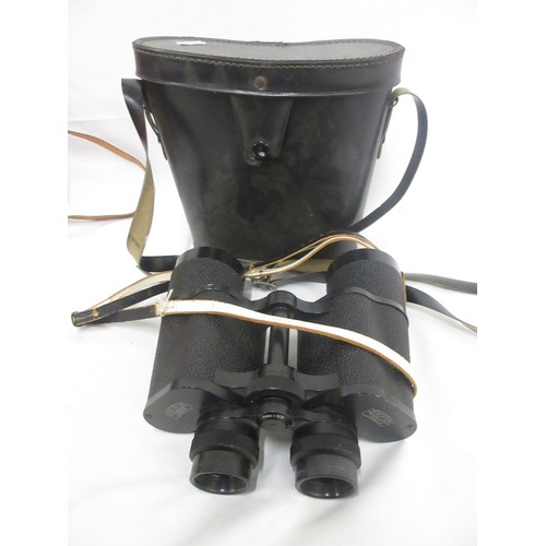 146 - Three pairs of binoculars by various manufacturers incl. Hunter 7x50, Zuiho O.I.C 10x50 (protective ... 