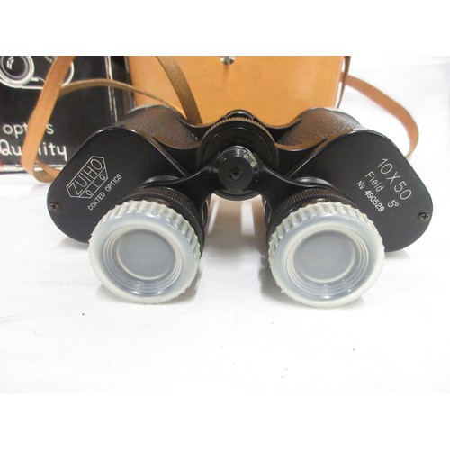 146 - Three pairs of binoculars by various manufacturers incl. Hunter 7x50, Zuiho O.I.C 10x50 (protective ... 