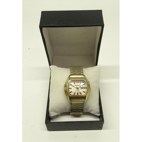 456 - Orient gold plated automatic wristwatch with day/date, signed silver striped dial with baton indices... 