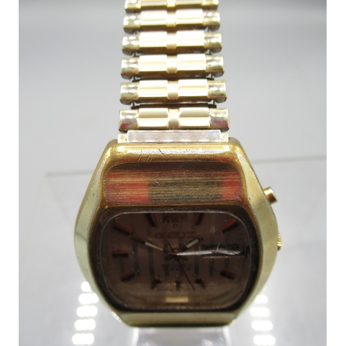456 - Orient gold plated automatic wristwatch with day/date, signed silver striped dial with baton indices... 