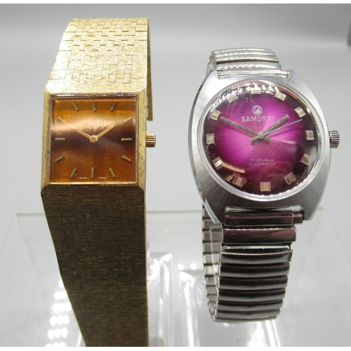 459 - Rotary gold plated wristwatch on integrated bark effect bracelet, signed Tiger's Eye dial with baton... 