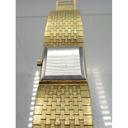 459 - Rotary gold plated wristwatch on integrated bark effect bracelet, signed Tiger's Eye dial with baton... 