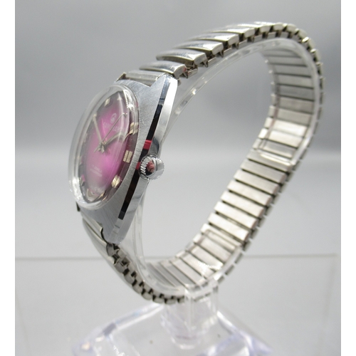 459 - Rotary gold plated wristwatch on integrated bark effect bracelet, signed Tiger's Eye dial with baton... 