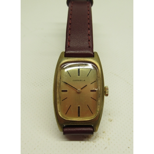 460 - Caravelle gold plated wristwatch, signed gold dial with baton indices, signed snap on case back no. ... 