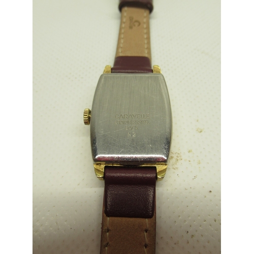 460 - Caravelle gold plated wristwatch, signed gold dial with baton indices, signed snap on case back no. ... 