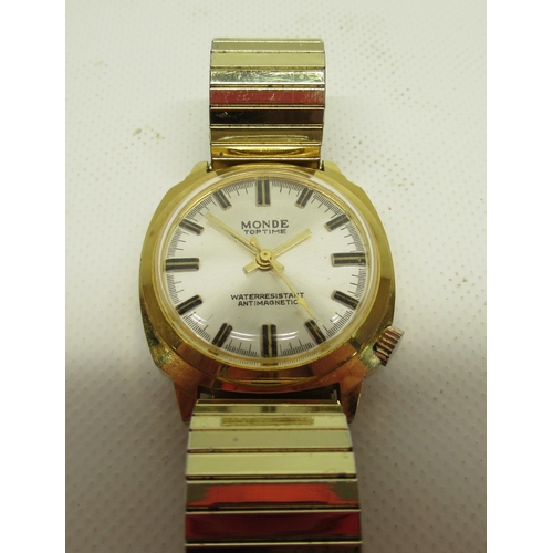 460 - Caravelle gold plated wristwatch, signed gold dial with baton indices, signed snap on case back no. ... 