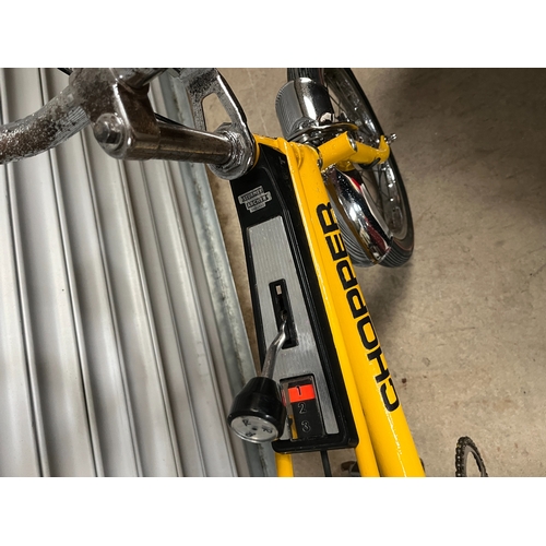 Yellow Raleigh Chopper MKI bicycle
