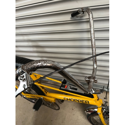 Yellow Raleigh Chopper MKI bicycle